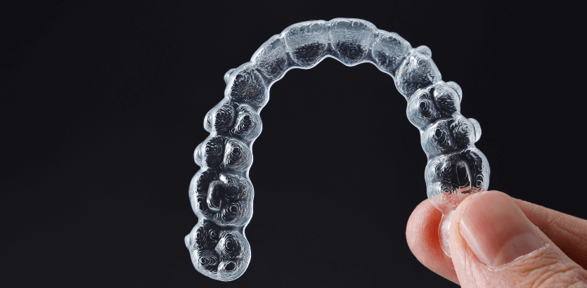 How Clear Aligners Can Enhance Your Oral Health Beyond Straightening